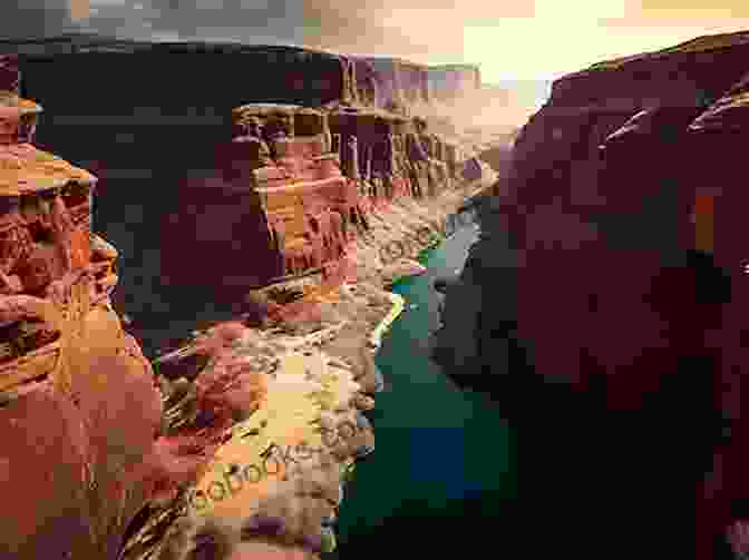 A Breathtaking Shot Of A Towering Canyon With Sheer Rock Faces And A Winding River Below, With A Group Of Riders Crossing A Narrow Bridge The Good Rider: Part Two