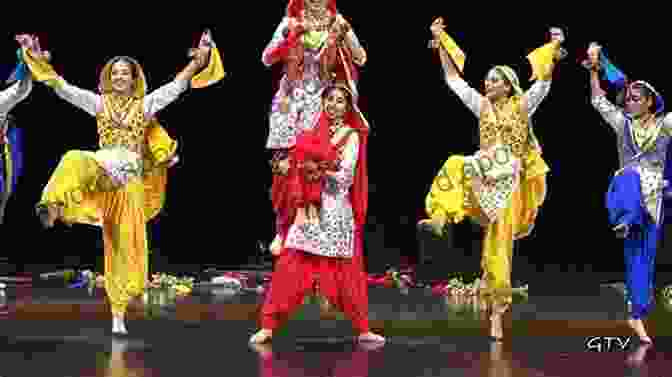 A Group Of Dancers Performing Bhangra, A High Energy Dance Music That Embodies South Asian Cultural Identity. Bhangra And Asian Underground: South Asian Music And The Politics Of Belonging In Britain