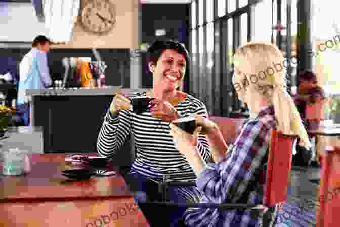 A Scene From A Movie, Showing Two People Talking In A Cafe Heroes And Villains: Essays On Music Movies Comics And Culture