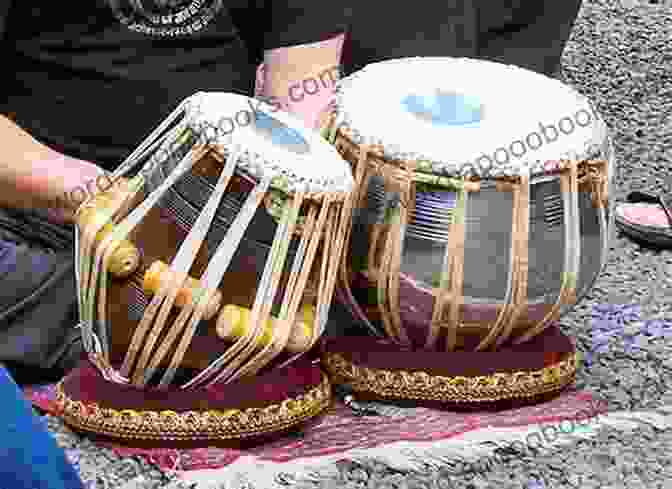 A Vibrant Performance Of South Asian Music, Featuring Traditional Instruments Like The Sitar, Tabla, And Harmonium. Bhangra And Asian Underground: South Asian Music And The Politics Of Belonging In Britain