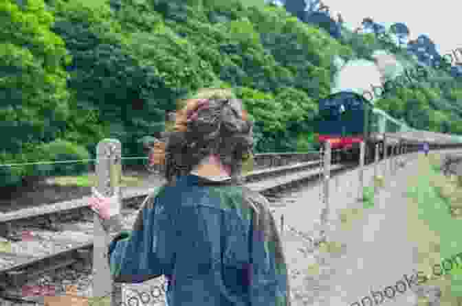 A Woman's Silhouette Standing On Railroad Tracks With A Train Approaching The Girl On The Tracks: A WW2 Historical Novel Based On A True Story