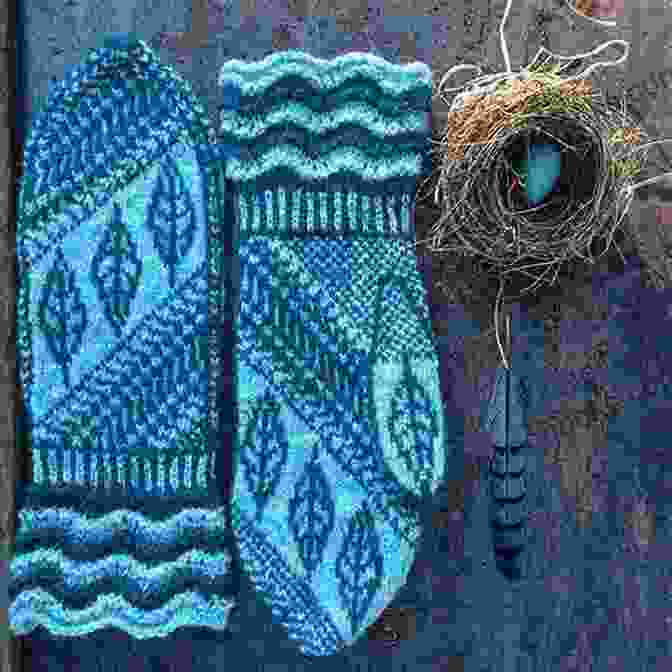 Feather And Fan Mittens In Soft Blue Yarn, Featuring Lace Pattern And Ribbed Cuffs Feather And Fan Booties And Mittens Knitting Pattern Mackenzie