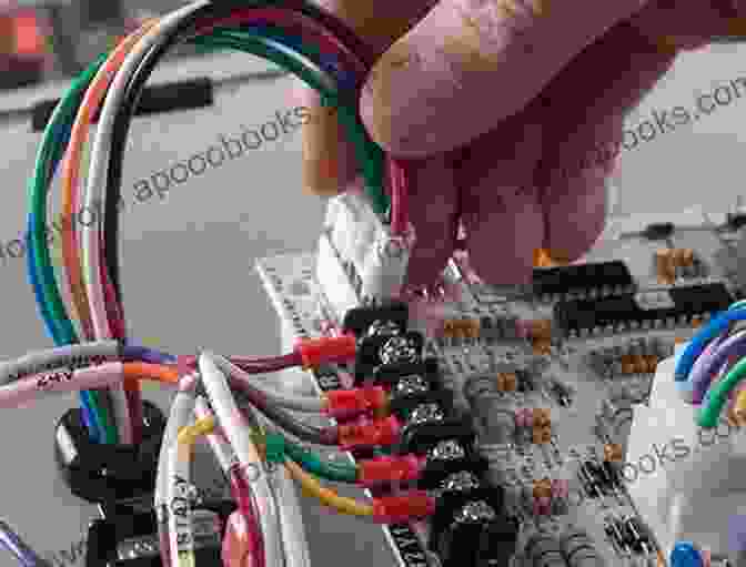 Image Of A Circuit Board With Wires And Components Being Modified, Representing Hardware Hacking Handmade Electronic Music: The Art Of Hardware Hacking