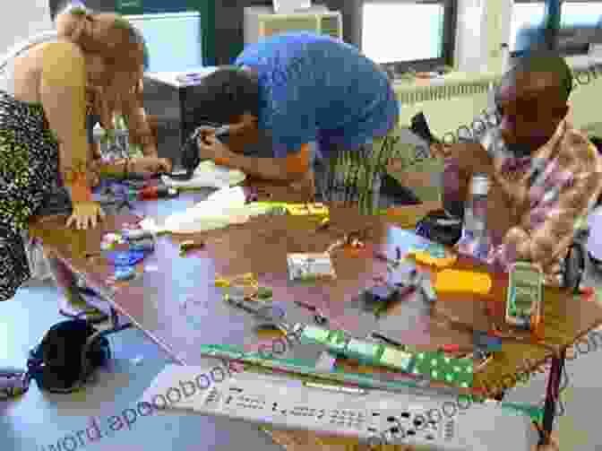 Image Of A Group Of People Working On Circuit Bending Projects, Showcasing The Collaborative And Experimental Nature Of Handmade Electronic Music Handmade Electronic Music: The Art Of Hardware Hacking