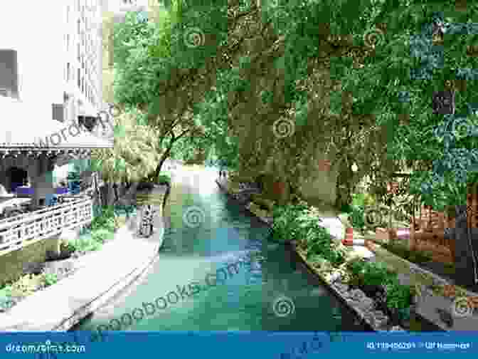 Lush Greenery Lining The Banks Of The San Antonio Riverwalk With Towering Trees And Blooming Flowers The Stunning Visual Surprises Of The San Antonio Riverwalk: Photographic Images Of Artist Marques Vickers