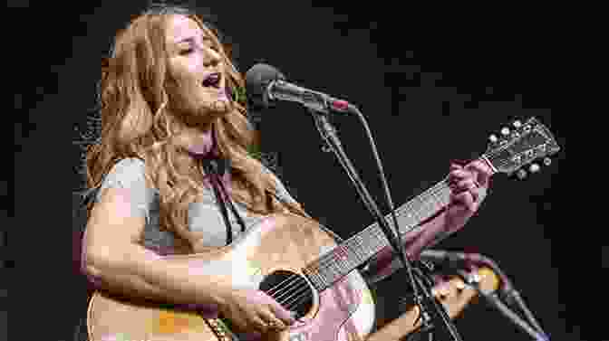 Margo Price Performing Onstage, Guitar In Hand, Crowd Cheering It Gets Me Home This Curving Track: Objects Essays 2024